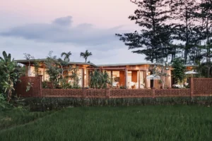 Villa Sawah by Stilt Studios with sustainability material building and rice field view